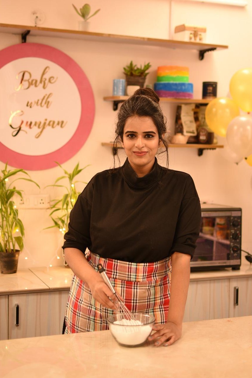 Gunjan Sharma whisking in the teaching kitchen